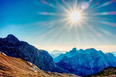 Scenic view of mountains against sky during winter