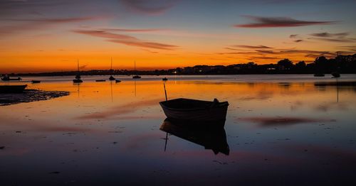 Scenic view of sea at sunset