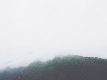 Scenic view of mountains during foggy weather