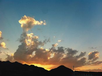 Scenic view of mountains at sunset