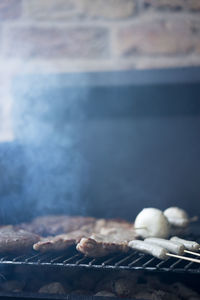 Close-up of food on barbecue grill