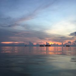 Scenic view of sea against sky at sunset