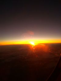 Scenic view of landscape against sky during sunset