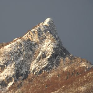 Low angle view of mountain against clear sky