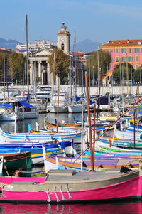 Boats moored at harbor