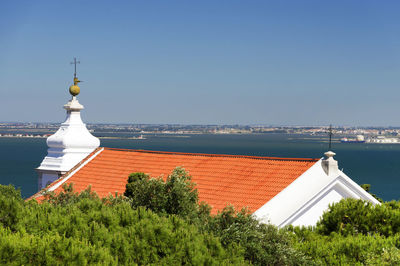 View of church against clear blue sky