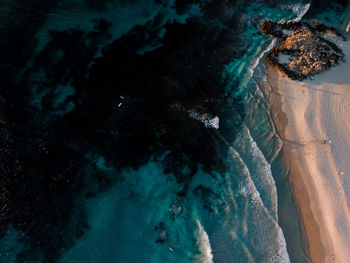 High angle view of rocks on shore