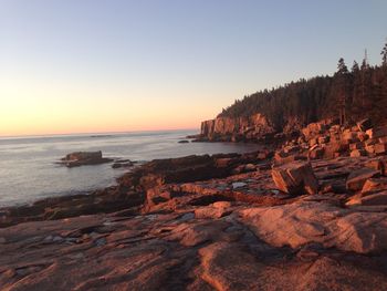 Scenic view of sea at sunset