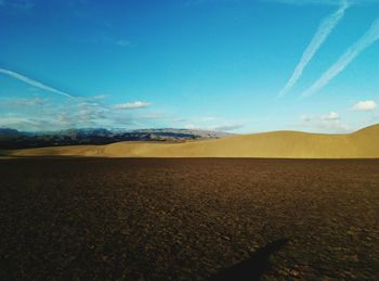 Scenic view of desert against sky