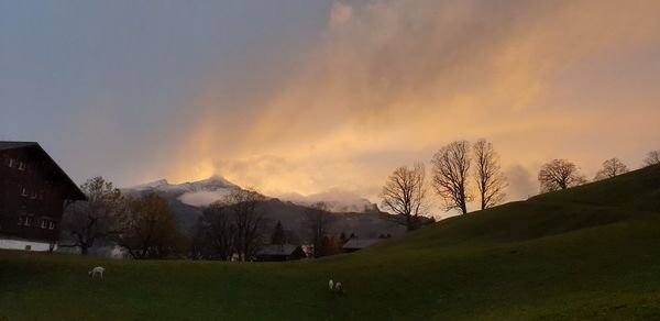 Scenic view of mountains against sky during sunset