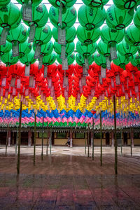 Multi colored chinese lanterns hanging from ceiling