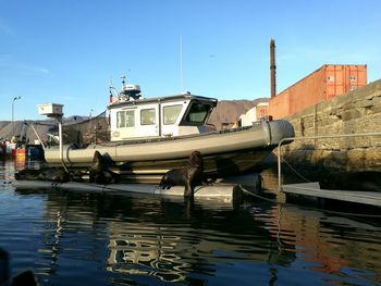 Nautical vessel at aquarium against clear sky