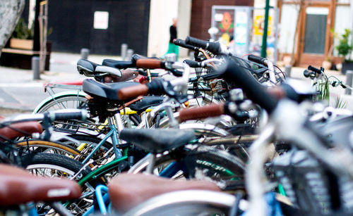 Close-up of bicycle parked in city