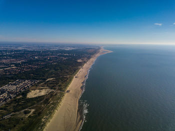 High angle view of beach against blue sky