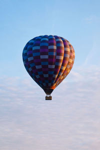 Low angle view of hot air balloon flying in sky