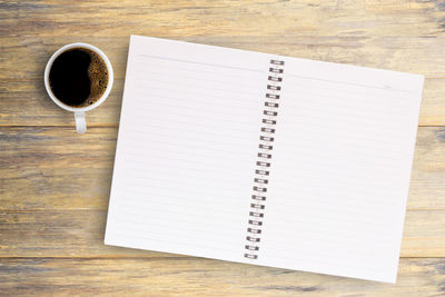 High angle view of coffee cup on table