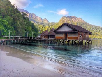 Scenic view of sea with mountains in background