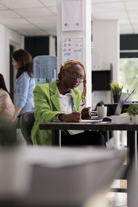 Business colleagues working in creative office