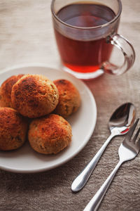 Close-up of cookies in plate on table