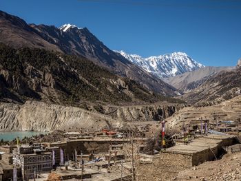 Scenic view of snowcapped mountains against sky