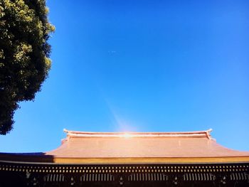 Low angle view of building against blue sky