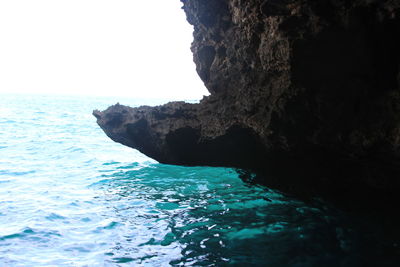 Scenic view of sea against blue sky