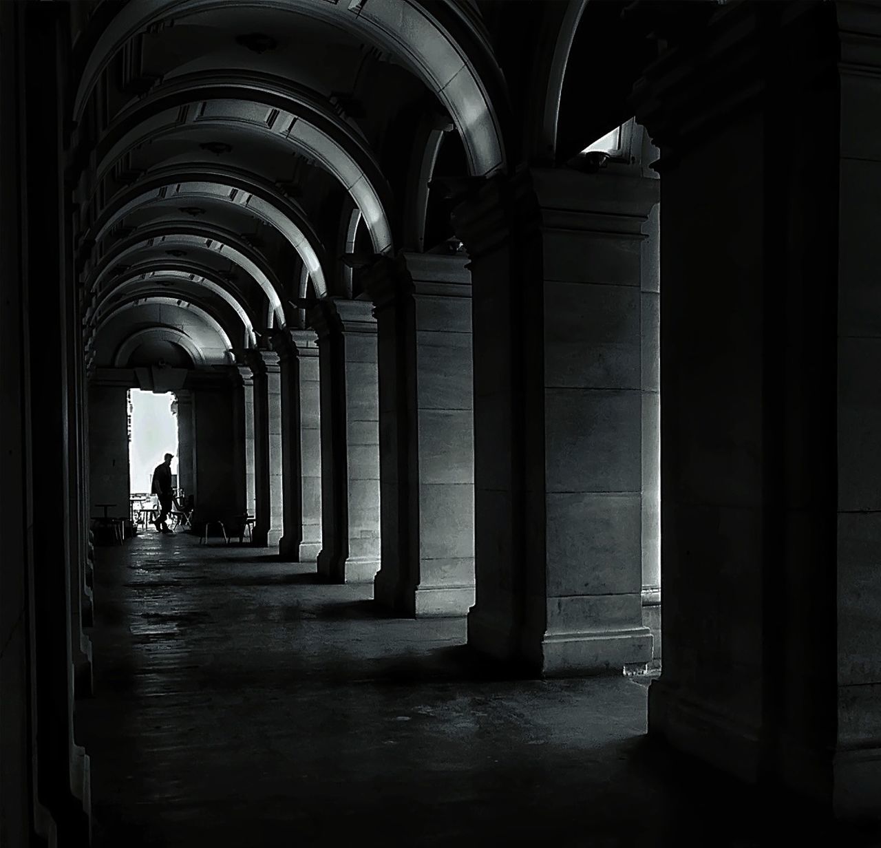 indoors, arch, architectural column, architecture, corridor, built structure, column, colonnade, history, famous place, travel destinations, the way forward, travel, tourism, pillar, interior, men, in a row, ceiling