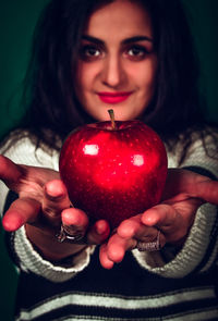 Portrait of a girl holding water