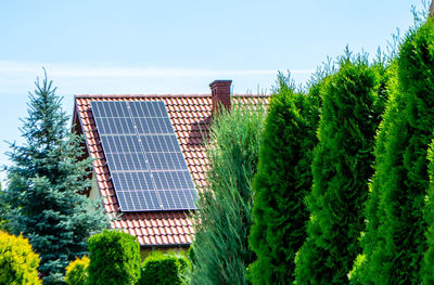 House roof with photovoltaic modules
