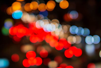 Defocused image of illuminated lights at night