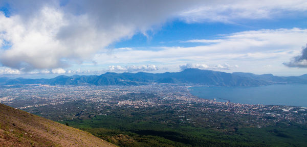 Panoramic view of landscape against cloudy sky