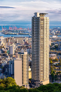 Modern buildings in city against sky