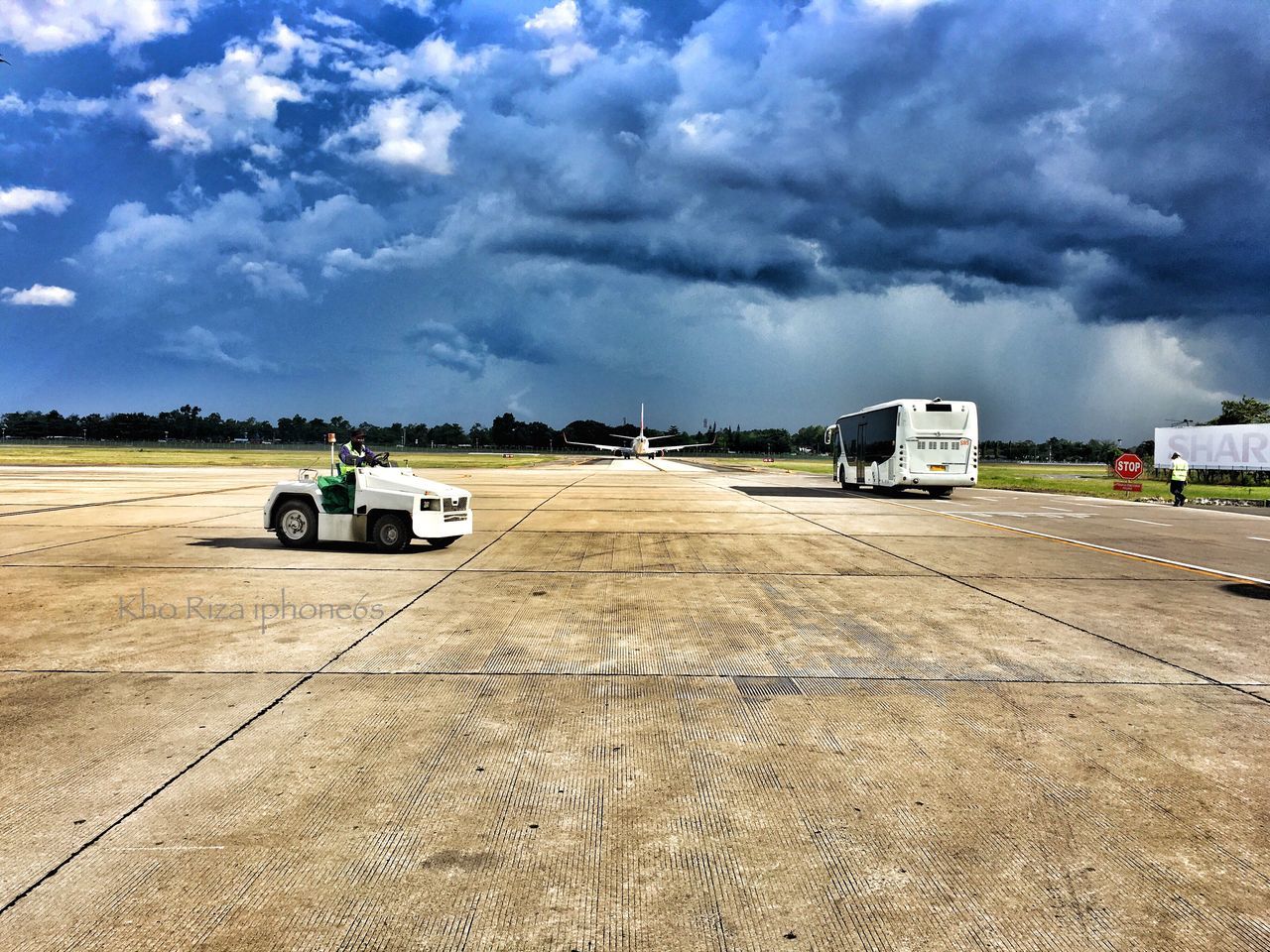 transportation, sky, cloud - sky, cloudy, land vehicle, mode of transport, car, road, landscape, cloud, overcast, weather, travel, day, field, street, outdoors, nature, no people, the way forward