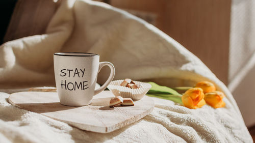 Close-up of coffee cup on table