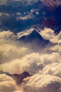 Low angle view of majestic mountains against sky