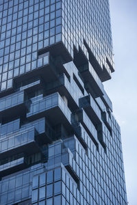 Low angle view of modern buildings against sky