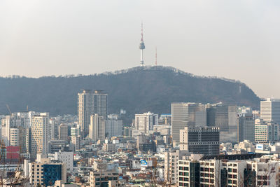 Cityscape against clear sky