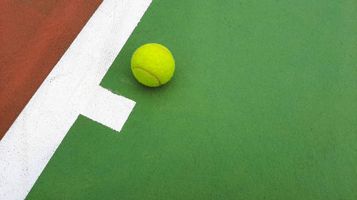 High angle view of tennis ball on tennis court