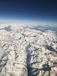 Aerial view of snow covered landscape