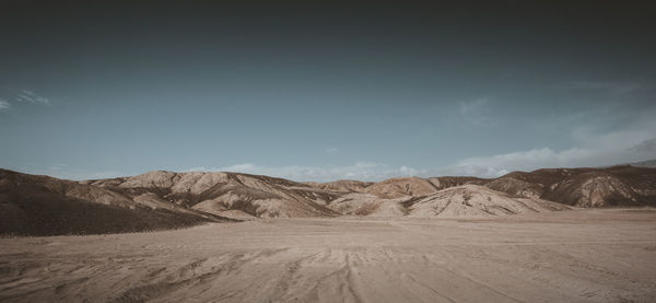 Scenic view of desert against sky