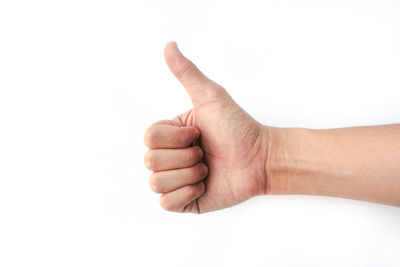 Close-up of human hand against white background