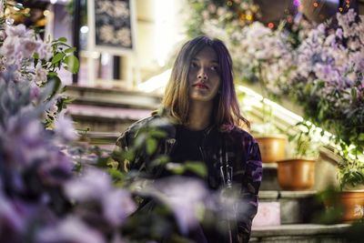 Portrait of beautiful young woman at home