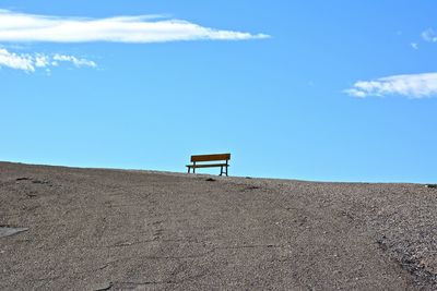 Scenic view of landscape against blue sky