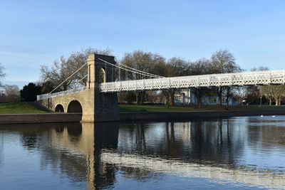 Bridge over river against sky