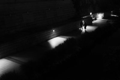 Couple walking at night