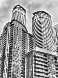 Low angle view of modern buildings against sky