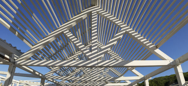 Low angle view of roof against sky