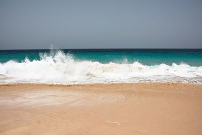 Scenic view of sea against clear sky