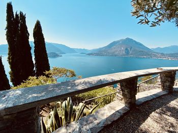 Scenic view of lake against clear blue sky