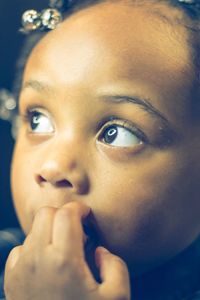 Close-up of boy looking away